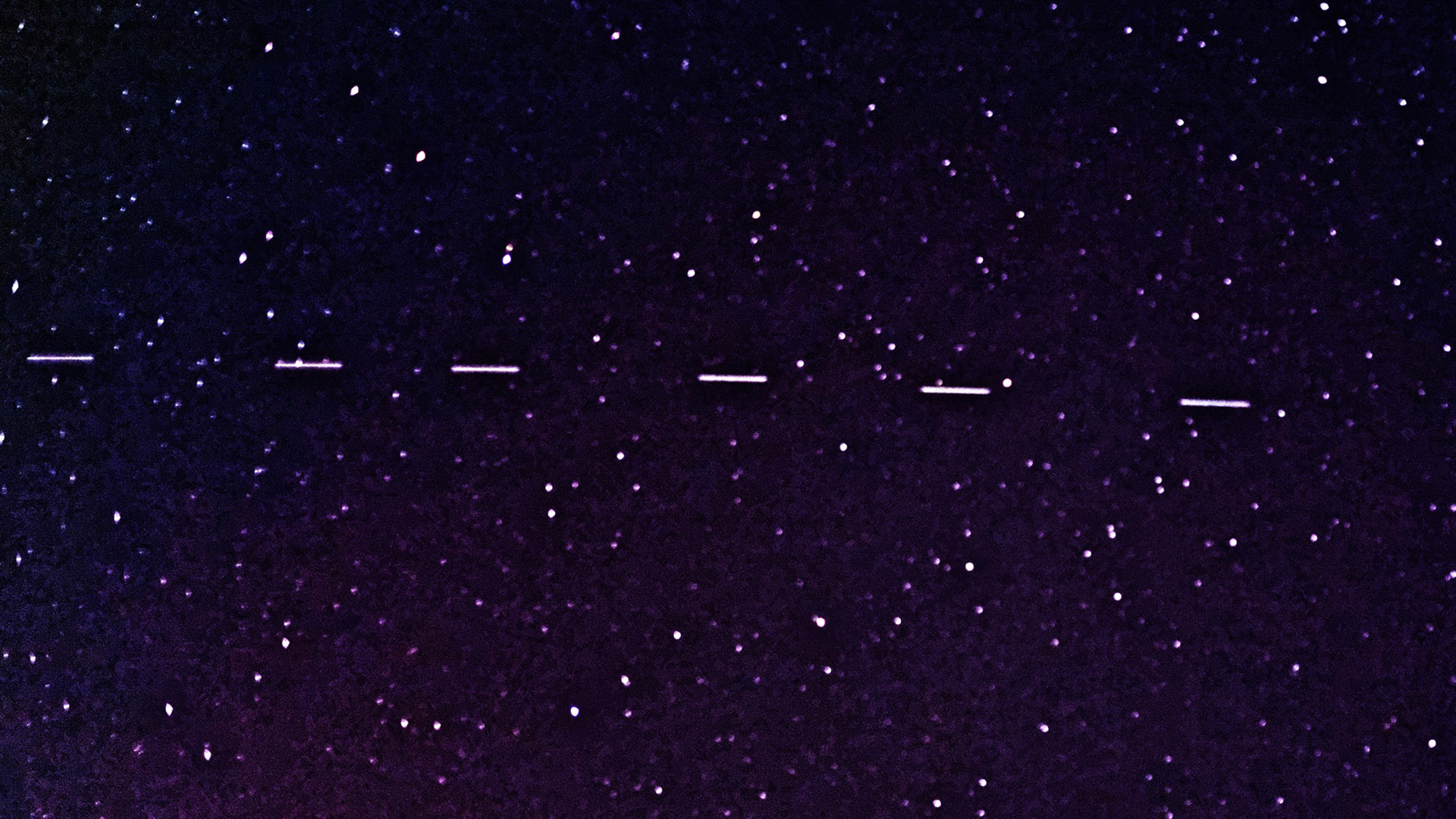 A 2-second image exposure shows Starlink satellites in front of a star field.