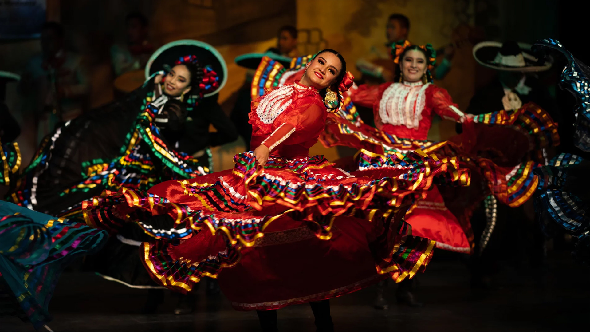 Members of the group Danzas y Bailes tradicionales Alma Mexicana perform a regional dance from Jalisco, México, at México City's Teatro Ferrocarrilero Gudelio Morales in July.