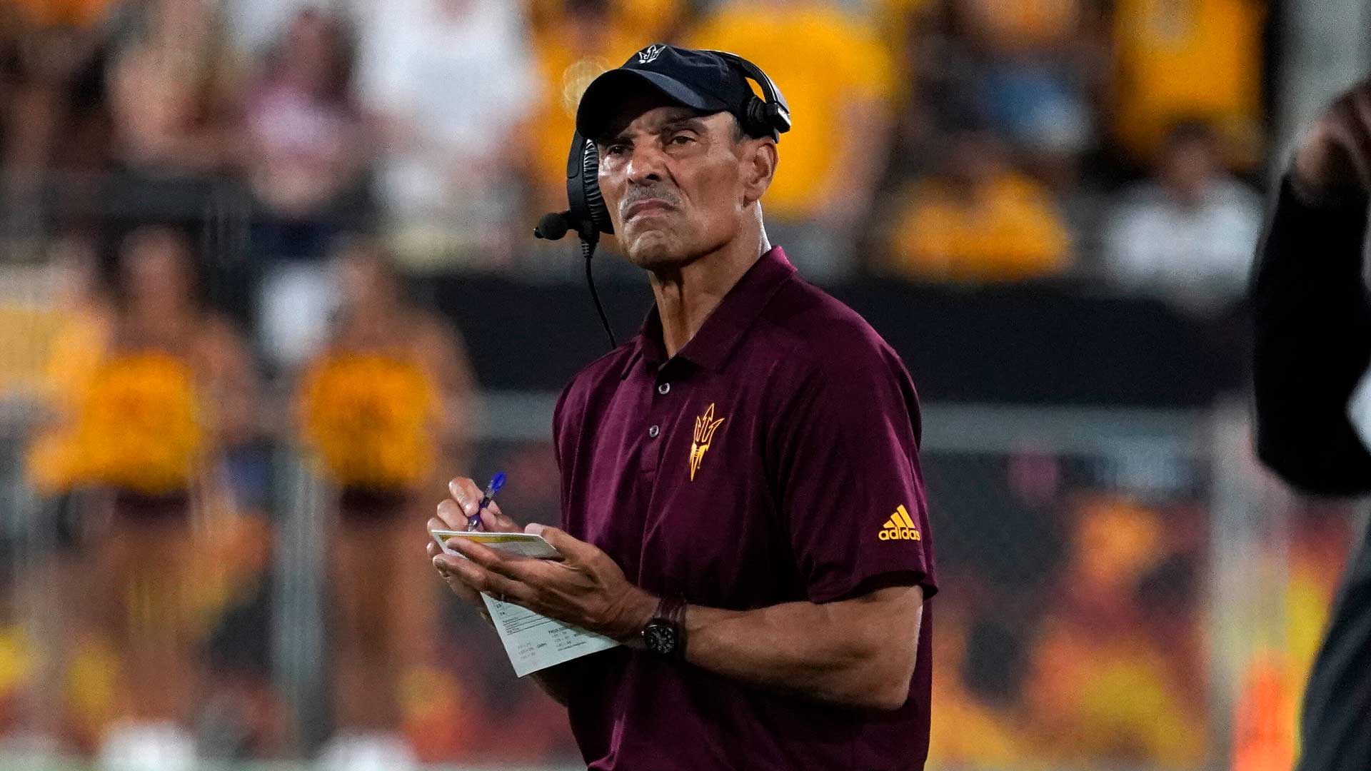 Arizona State coach Herm Edwards looks toward the scoreboard with his team his down against Eastern Michigan during the first half of an NCAA college football game Saturday, Sept. 17, 2022, in Tempe, Ariz.