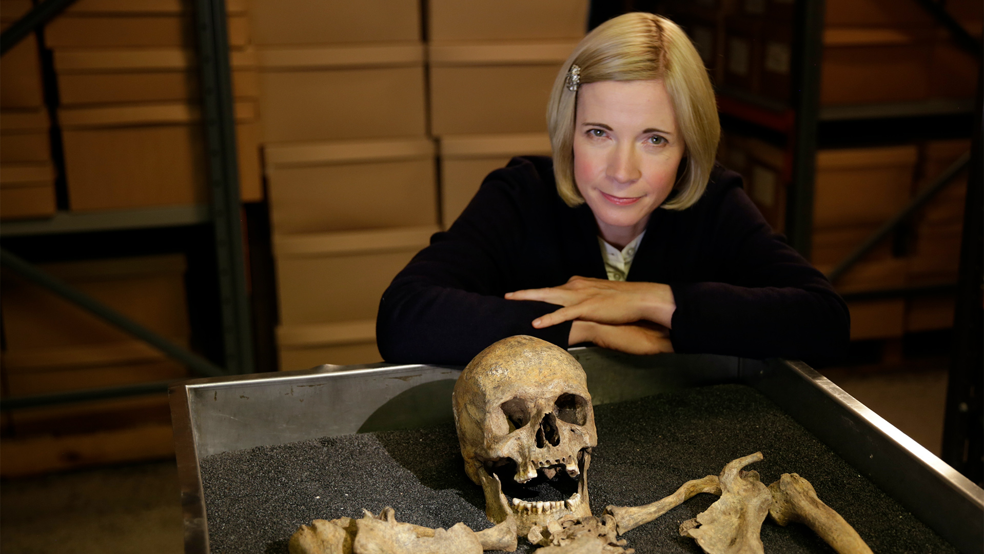 Lucy with Black Death skeleton at the Museum of London.