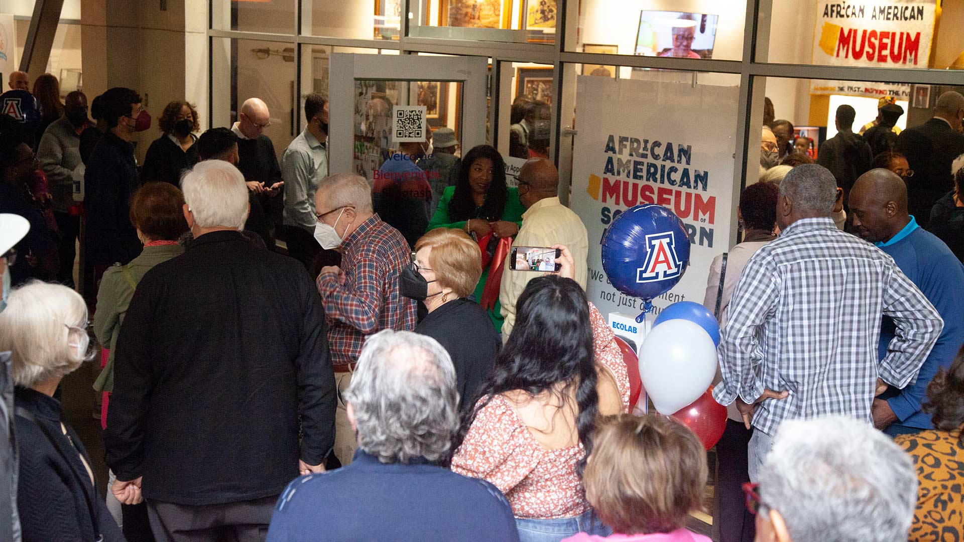 Crowd of people outside of the African American Museum of Southern Arizona