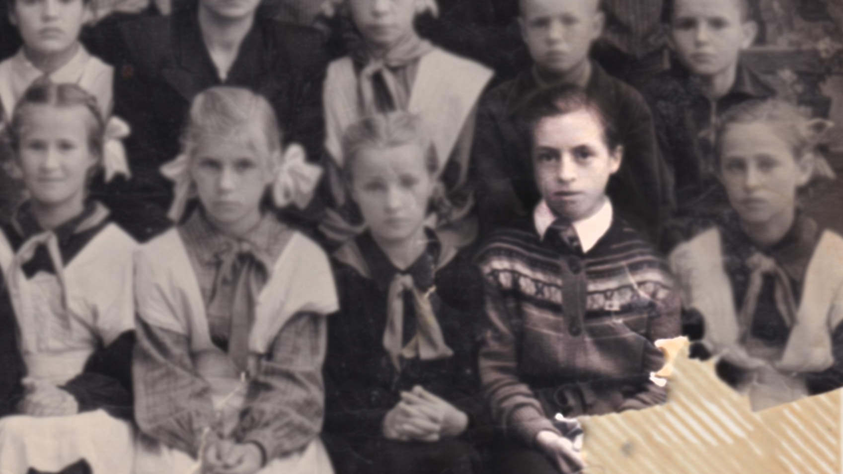 Ida Kvartovskaya, age 14 (bottom row, second from right), in 1954. When her family fled from the Nazi invasion they lost all their possessions including family photos.