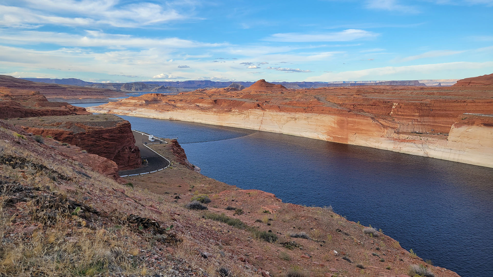 Bands of discolored rock show that Lake Powell's water levels are lower than they have been for much of its past.