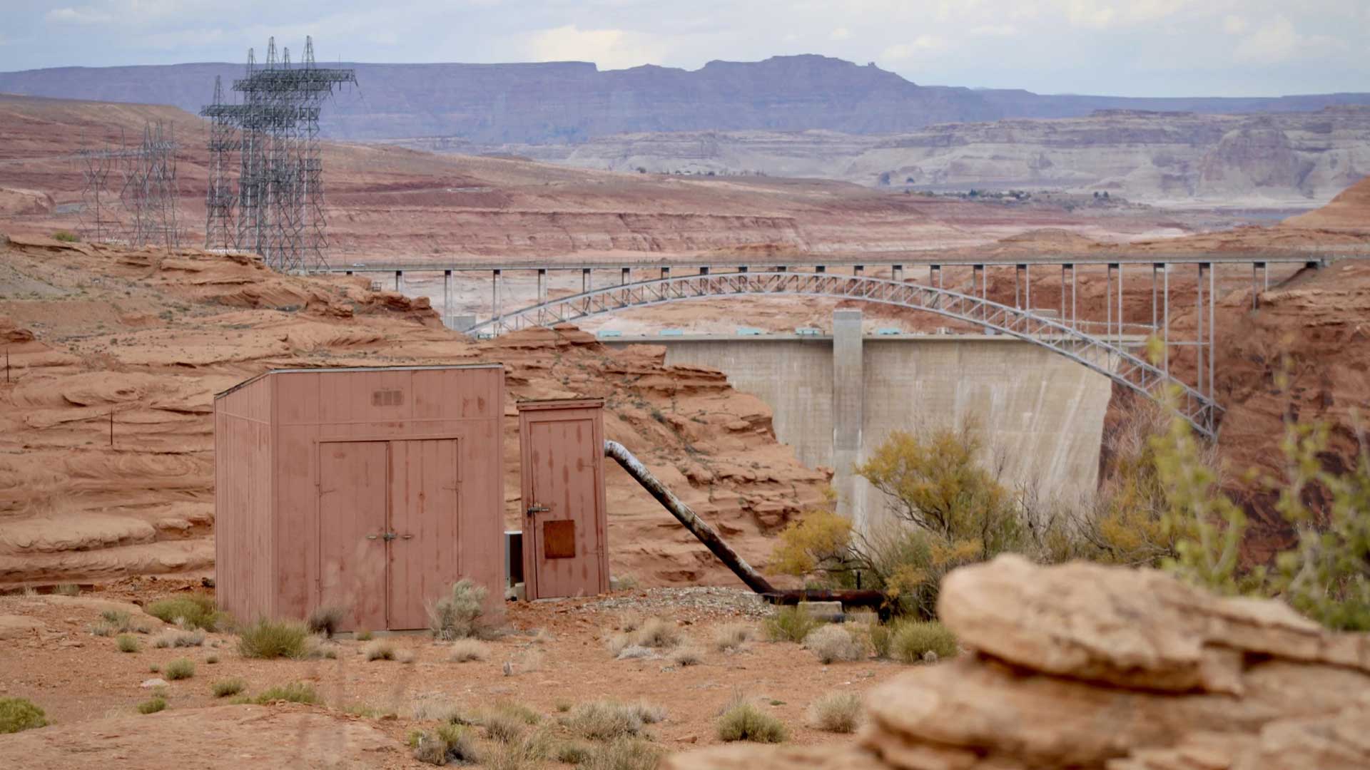A pipe carries water from the Colorado River into a shed in Page, Ariz. on November 2, 2022. 