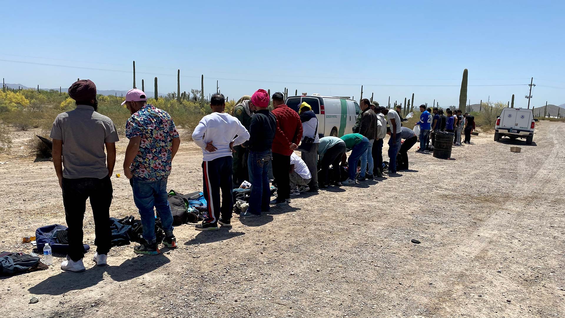 Border Patrol processing migrants who crossed the border outside of Lukeville, Arizona, in May 2023.
