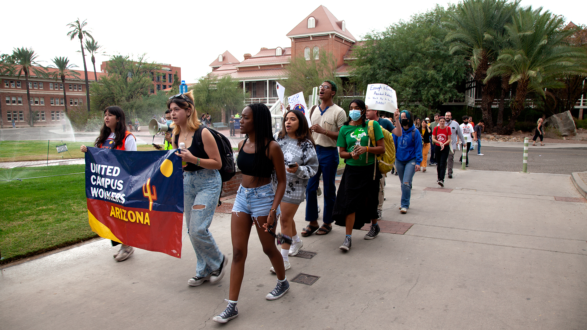 Protests from the United Campus Workers of Arizona and the Arizona Students' Association move from Old Main to the North Ballroom just before the Arizona Board of Regents begin the public portion of their November meeting on Thursday, Nov. 16, 2023.