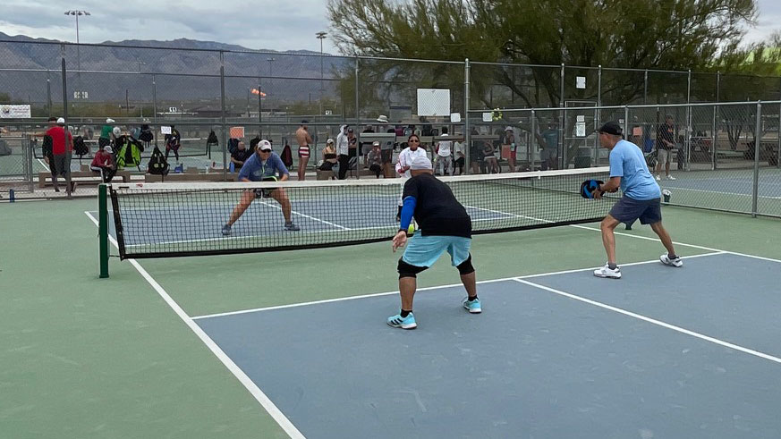Pickleball is one of the many activities that will be held during the 2024 Senior Olympic Festival in Tucson.  These people are playing in Udall Park, on Tucson's east side. 