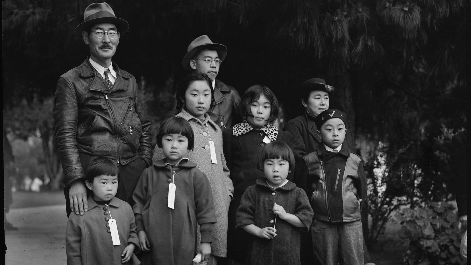 The Machida family as they waited for transportation to an internment camp in Hayward, California in May 1942. 