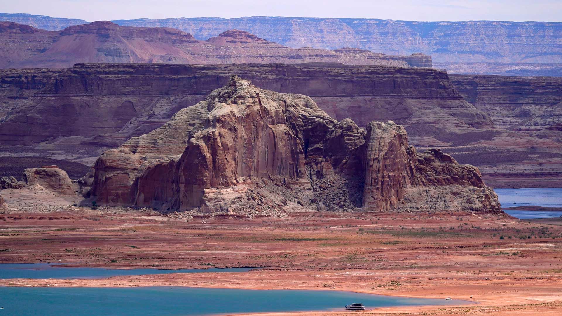 Low water levels at Wahweap Bay at Lake Powell along the Upper Colorado River Basin are shown, on June 9, 2021, at the Utah and Arizona border at Wahweap, Ariz. 