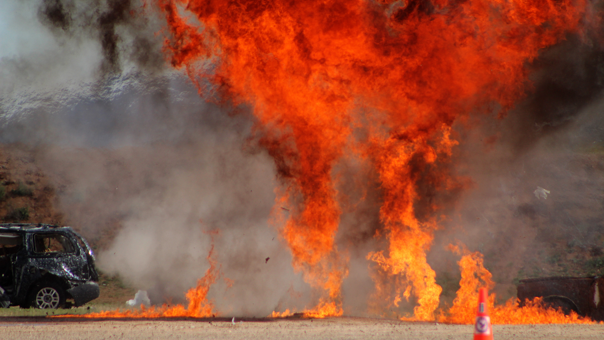 A bomb detonates during a VIP demonstration for Raven's Challenge, the world's largest bomb squad training, in Pinal Airpark on Thursday, March 2, 2023.