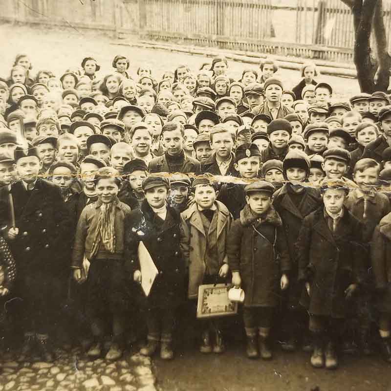 Simon’s Gentile school friend gifted him with this class photo from before the war. 