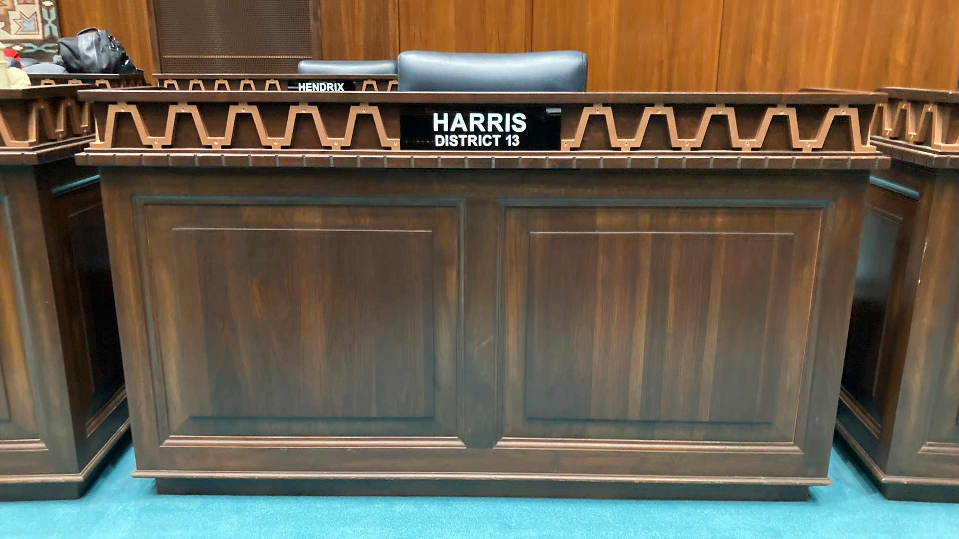 The desk used by Arizona Republican Rep. Liz Harris at the state Capitol in Phoenix stands empty moments after she was expelled from the Legislature on Wednesday, April 12, 2023. The Arizona House of Representatives expelled a Harris in a bipartisan vote after she organized a presentation accusing a wide range of politicians, judges and public officials of both parties of taking bribes from a Mexican drug cartel. 