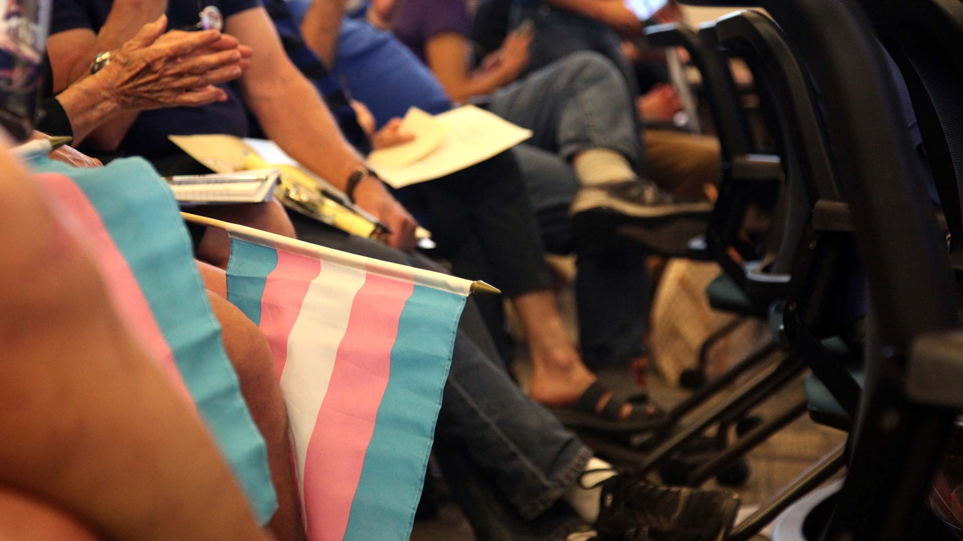 Transgender pride flags filled a Catalina Foothills School District Governing Board meeting on Tuesday, April 11, 2023.
