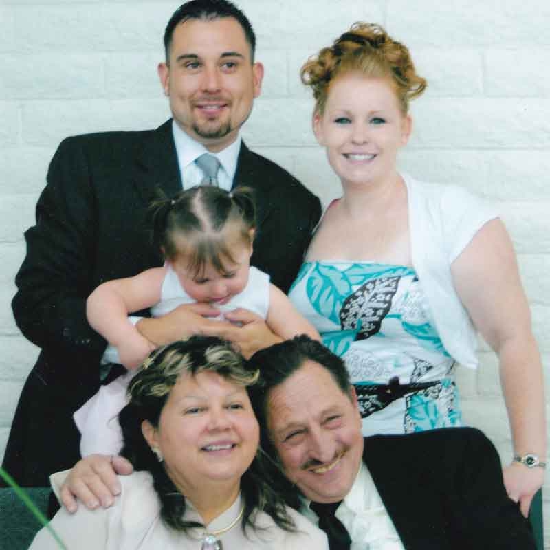 Wolfgang with wife, Vilma (left), son Michael, Michael’s partner, and their daughter, Jasmine.