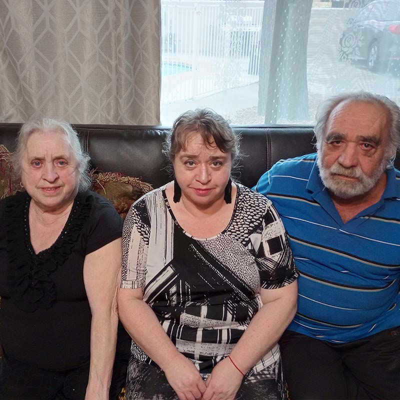 Ida (left) with daughter Raisa and husband, Oyser, in 2022. Her son and his family also emigrated to the United States. They all settled in Tucson. 