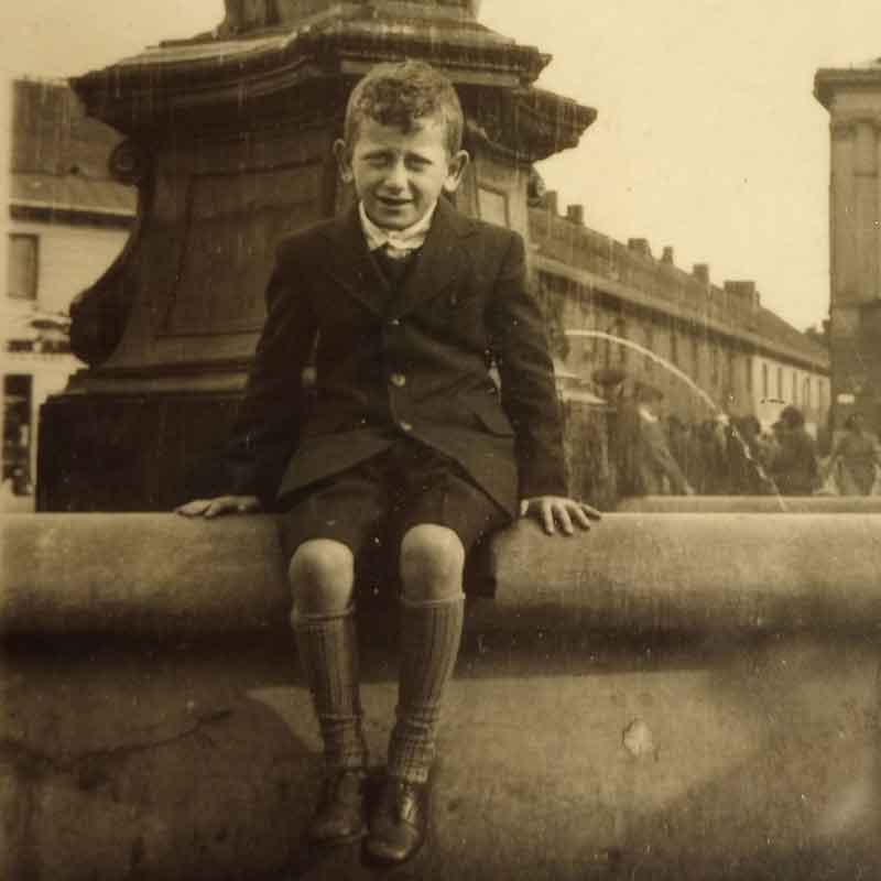 Pawel, age 8, at Kino Muranów fountain in Warsaw. Soon after this photo was taken, Germany invaded Poland.