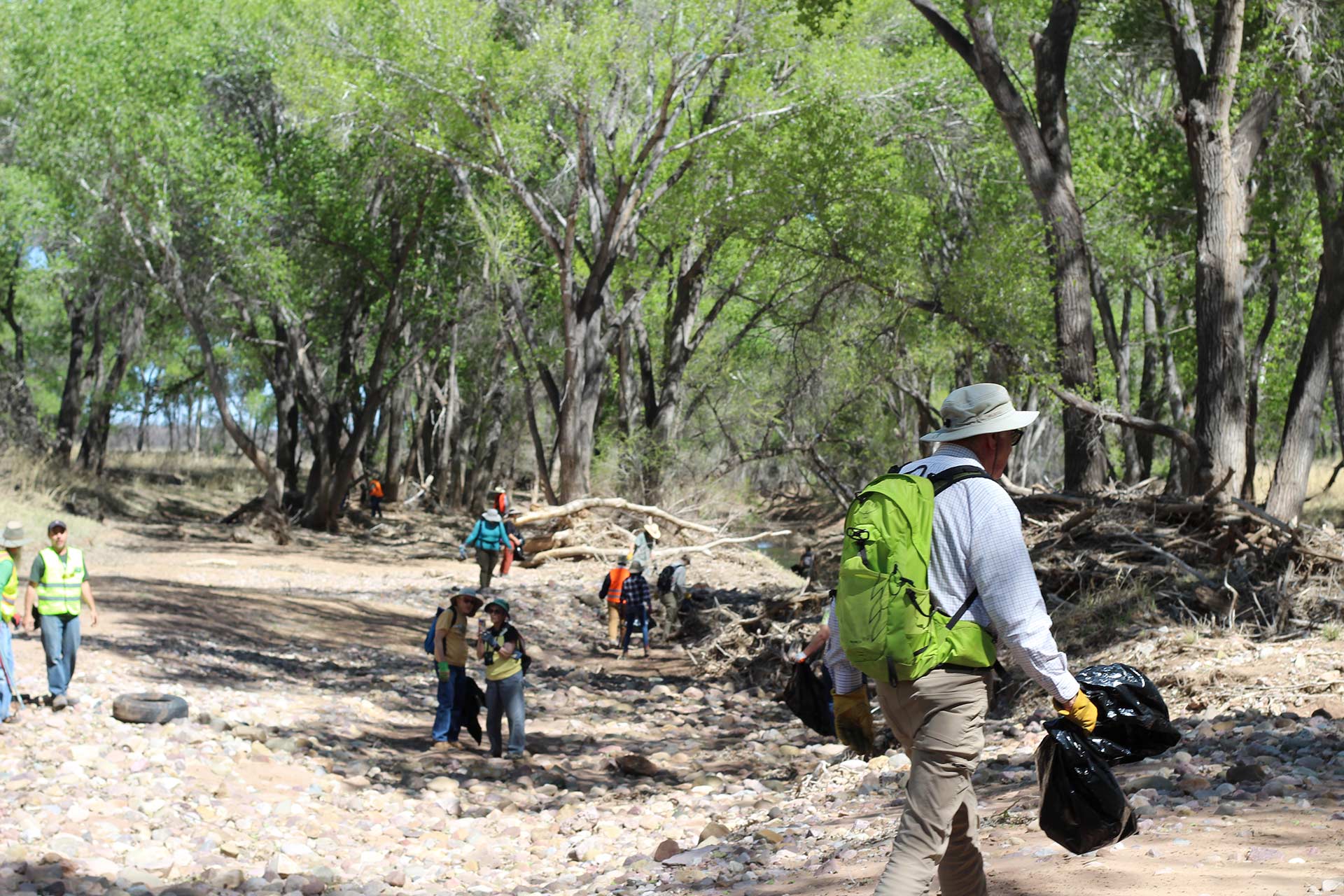 Border BioBlitz volunteers help cleanup trash at the San Pedro River on Saturday, April 1.