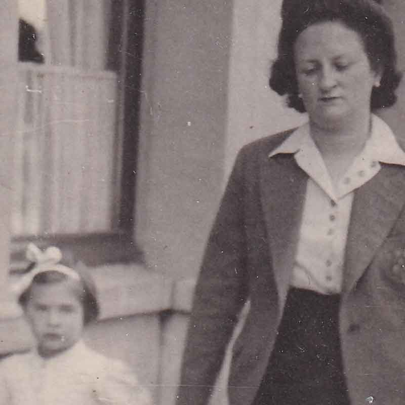 Paula (age 4) and her mother in 1941. Her mother is wearing a yellow star identifying her as a Jew. 'We could have been picked up off the streets by the Germans,' says Paula. 'This was the last time I was able to be outside with my mother until after the war.'