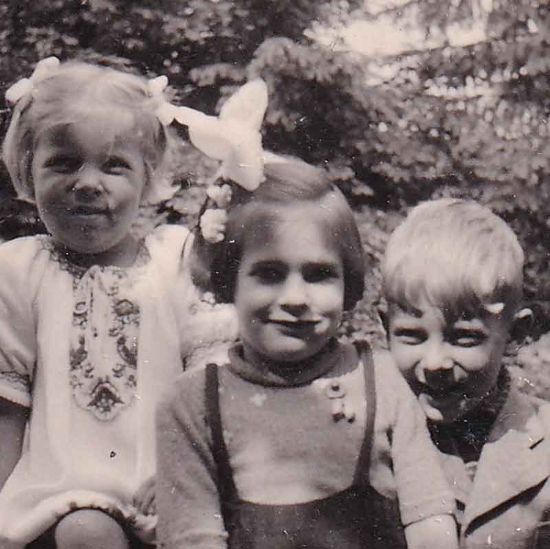 When she first moved in with the Ruiters, Paula (center) played with neighbor children. Then they started asking her why she didn’t have blonde hair or blue eyes. 
                                
