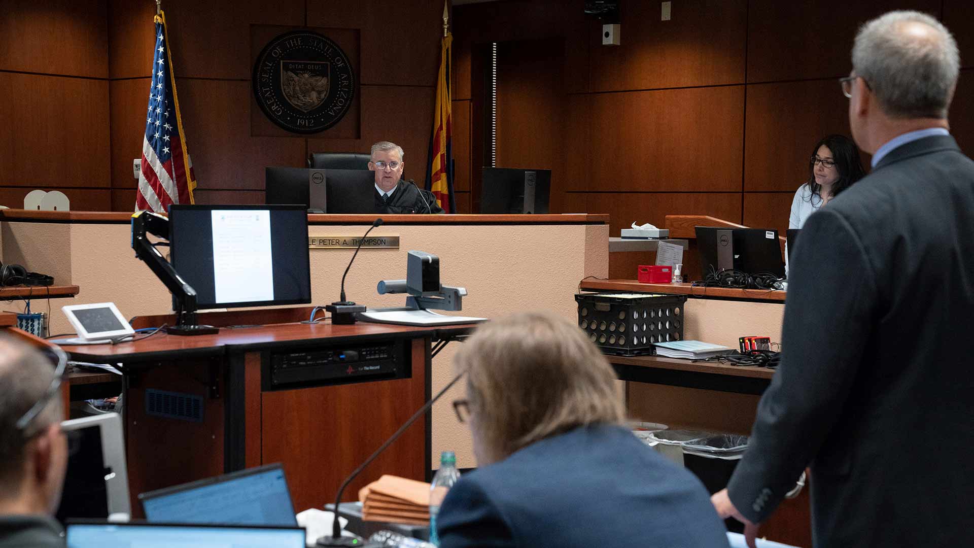 Attorneys listen to arguments during the Kari Lake election challenge trial, Wednesday, May 17, 2023, in Maricopa County Superior Court, Mesa, Ariz. 