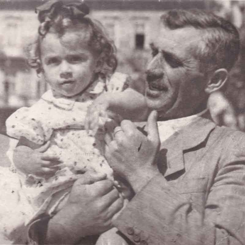 Theresa, age 2, with her parents.