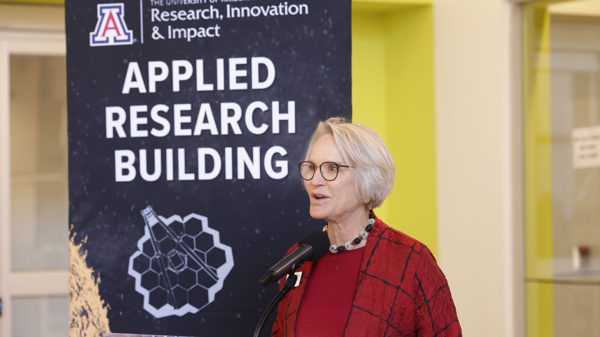 Senior vice president for research and innovation Elizabeth "Betsy" Cantwell speaks at the grand opening of the University of Arizona's Applied Research Building. 