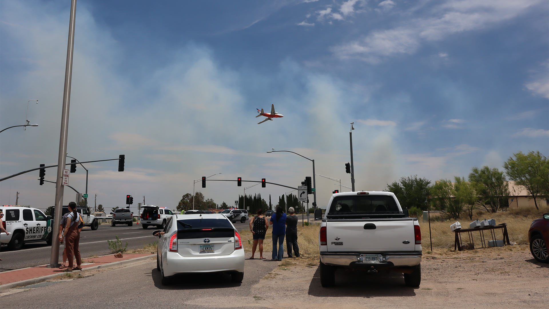 One of two tankers flies over the Hereford Post office to drop fire retardant on one of three fires reported in  Hereford and Palominas. June 22, 2023.