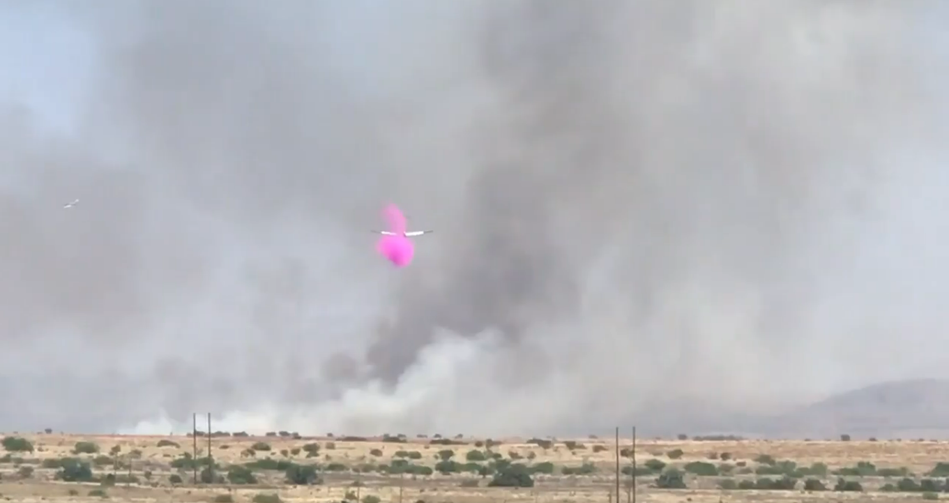 An air tanker drops fire retardant on the Western Hemp Fire on Fort Huachuca Tuesday. June 27, 2023. *screenshot from Fort Huachuca's Facebook video of the fire, posted at 10:45 a.m.* 
