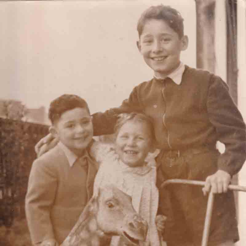 Robert (left) with his cousins in France. He picked up the language quickly. “I was a French kid,” he says.