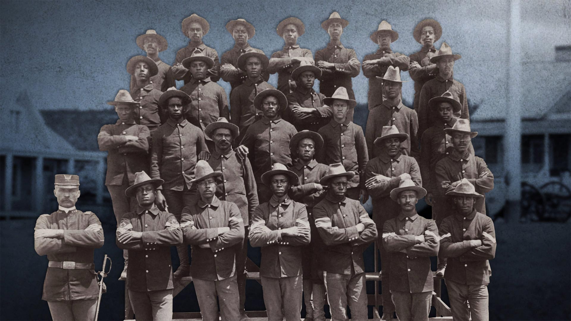 Group portrait of African American soldiers in Co. E, 9th United States Volunteer Infantry who fought in the Spanish-American War 