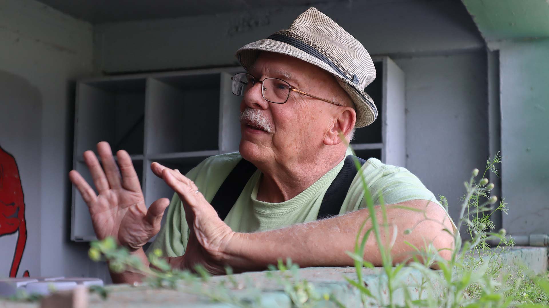 Bisbee historian Mike Anderson talks about the history of Warren Ballpark while in the dugout.