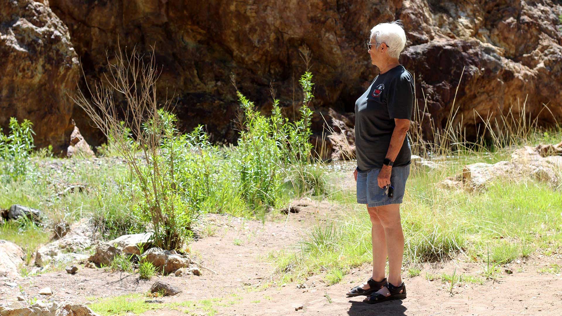 President of the Patagonia Area Resource Alliance (PARA), Carolyn Shafer, stands in one of her favorite places along Harshaw Creek in Patagonia, Arizona. Shafer has lived in the community for about 26 years. 