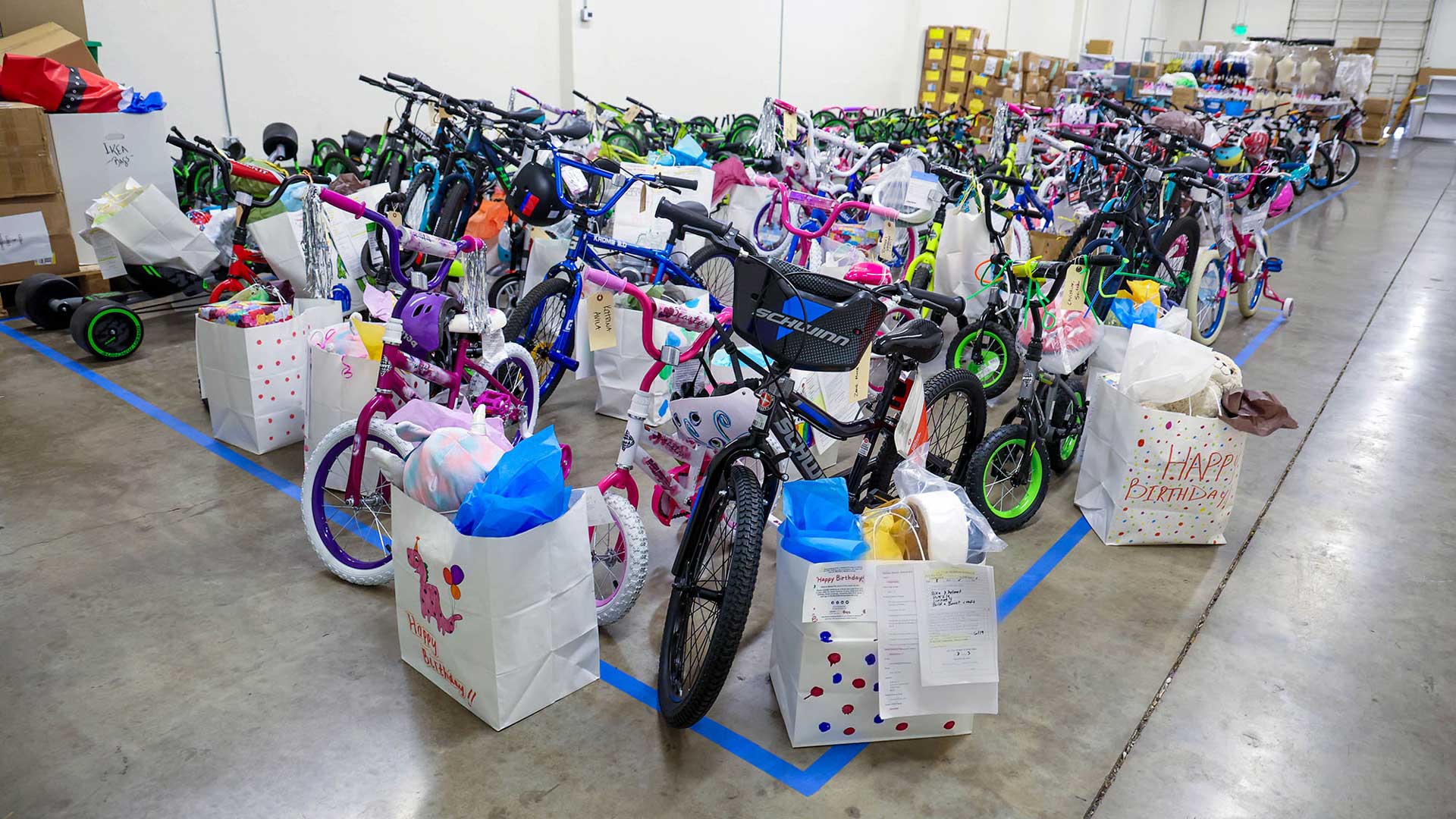 Arizona Helping Hands provides birthday gifts to foster children across the state. The gifts can include bikes, clothes, toys, books, and other goodies. 