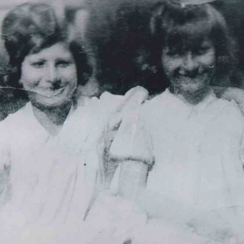 Yulia (left), age 4, with her twin sister, Yevgenia.