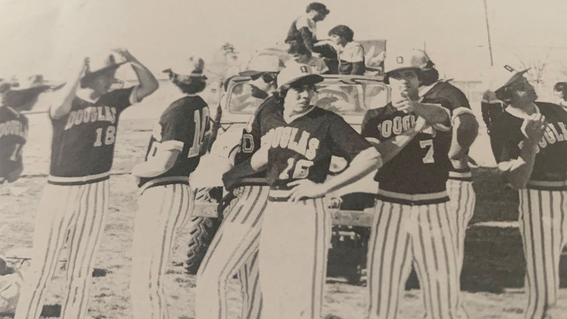 Pitcher for the 1982 Douglas High School Varsity baseball team Louie Varela, points to the camera. 
