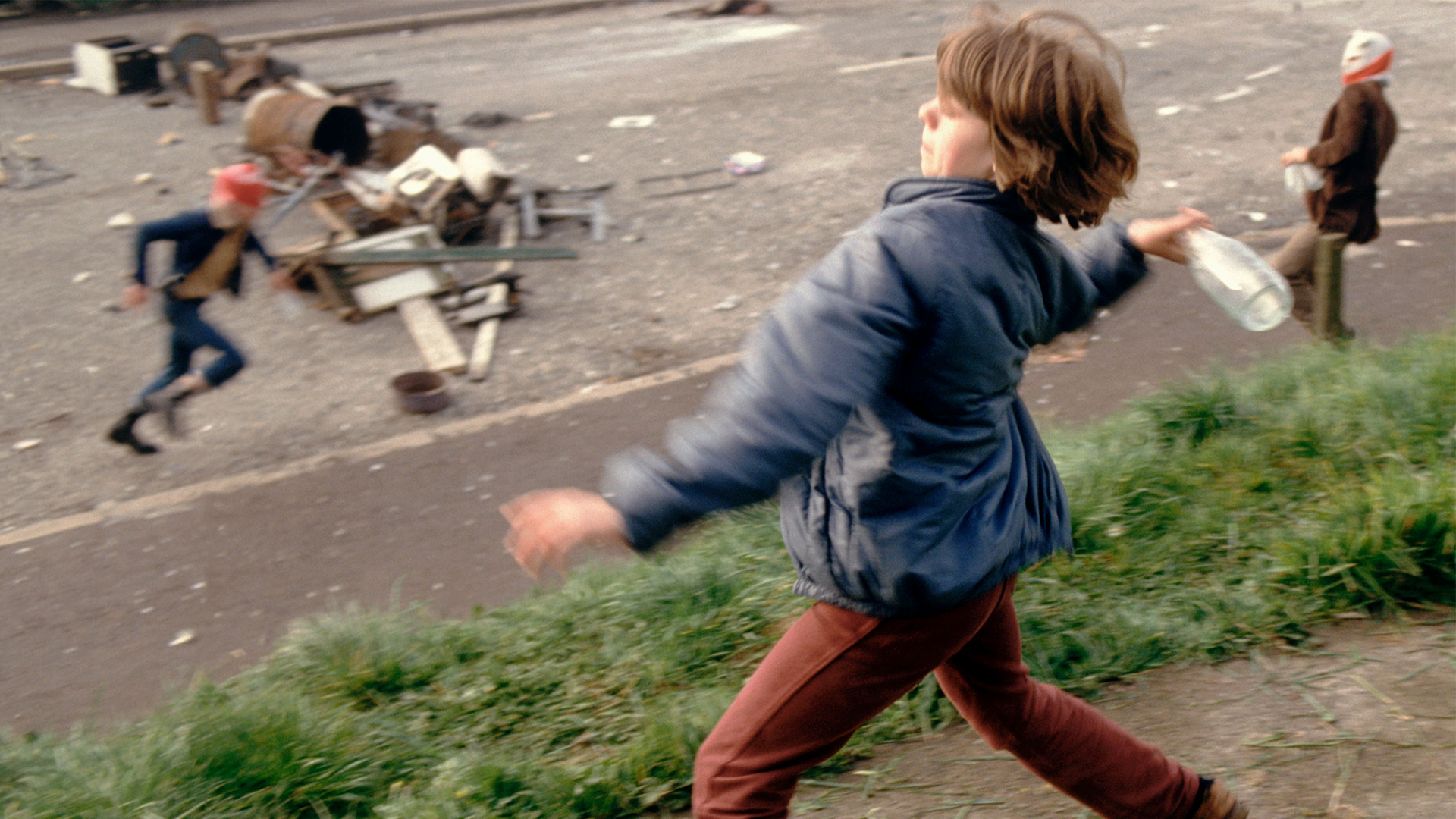 Anne Marie, aged 10, throwing bottles at British troops during a riot in Belfast, Northern Ireland, in 1981.