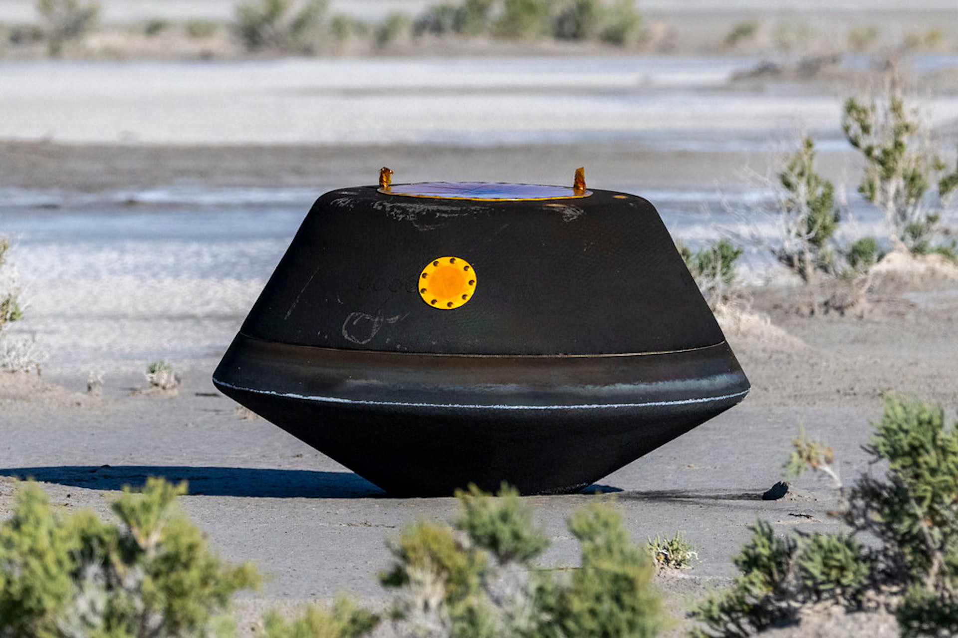 The sample return capsule from Osiris REx after parachuting into the Utah desert.