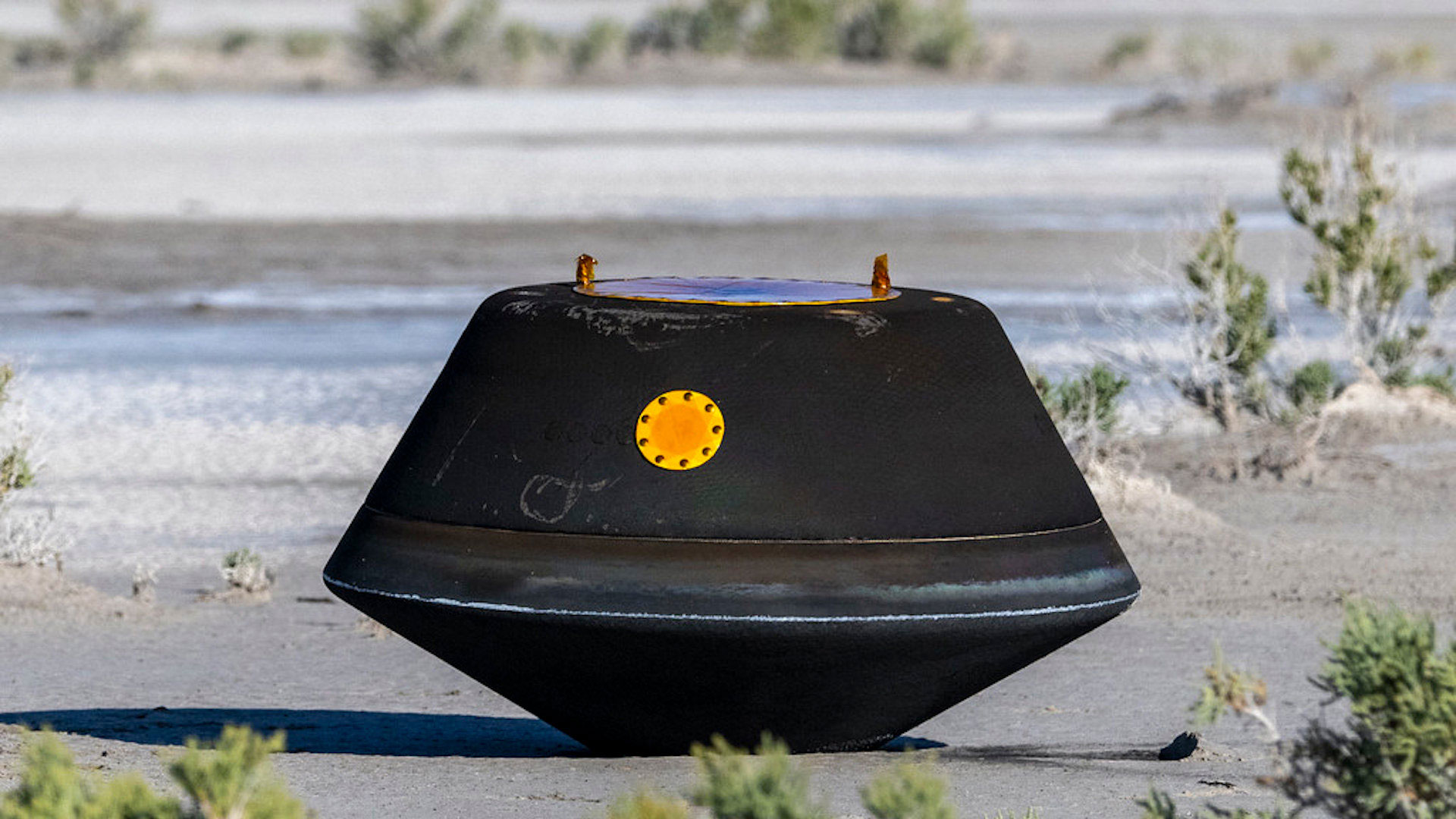 The sample return capsule from Osiris REx after parachuting into the Utah desert.