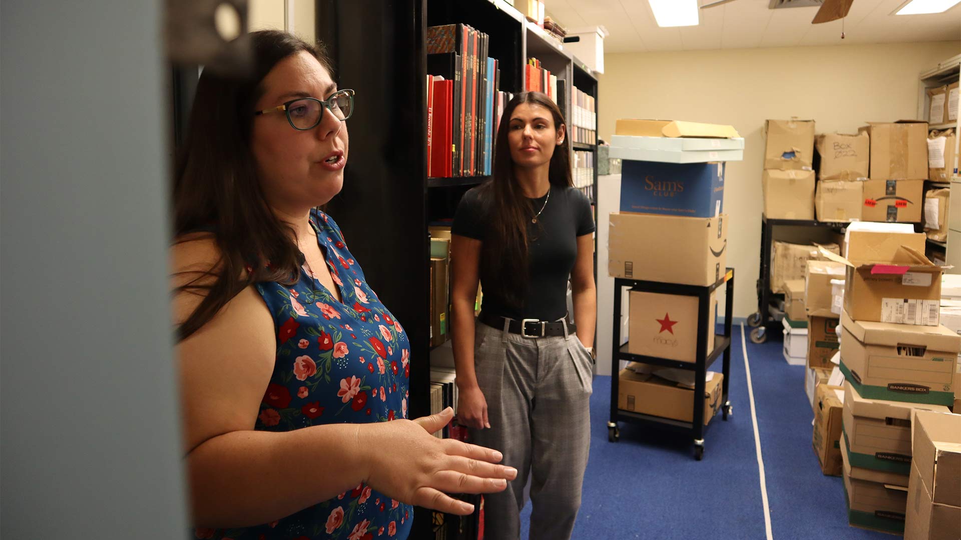 Cochise College Director of Library Services Karly Scarbrough (left) and Cochise College Librarian Archivist Ashlee Gray (right) discuss the beginnings of their Archiving Project, which aims to build a travelling display of past commencement programs. August 31, 2023.