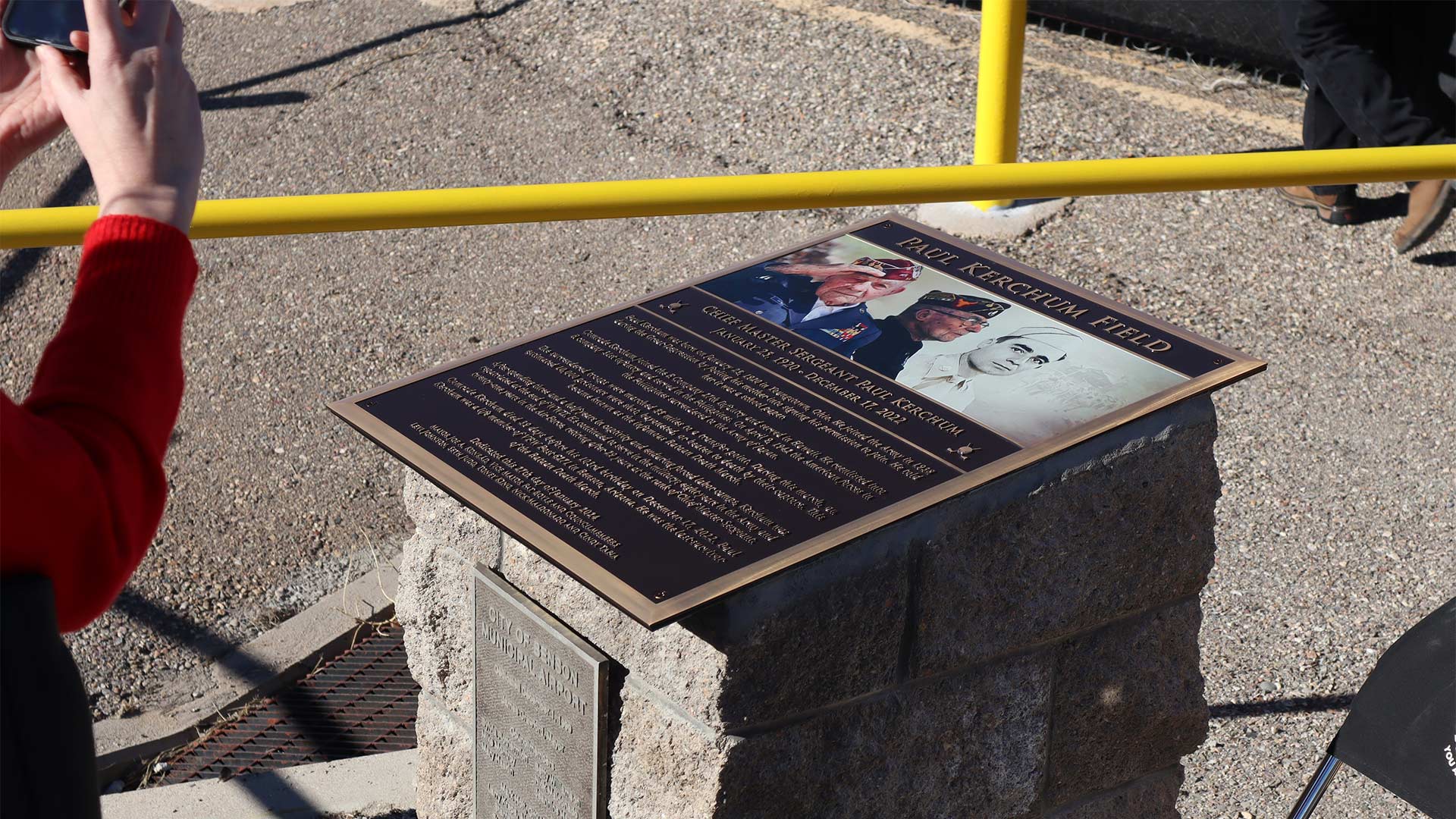 A plaque dedicating the Benson Airport to the late Ret. Chief Master Sergeant Paul Kerchum, who lived in Benson for around 60 years. The airport was named after Kerchum officially in August 2023.
