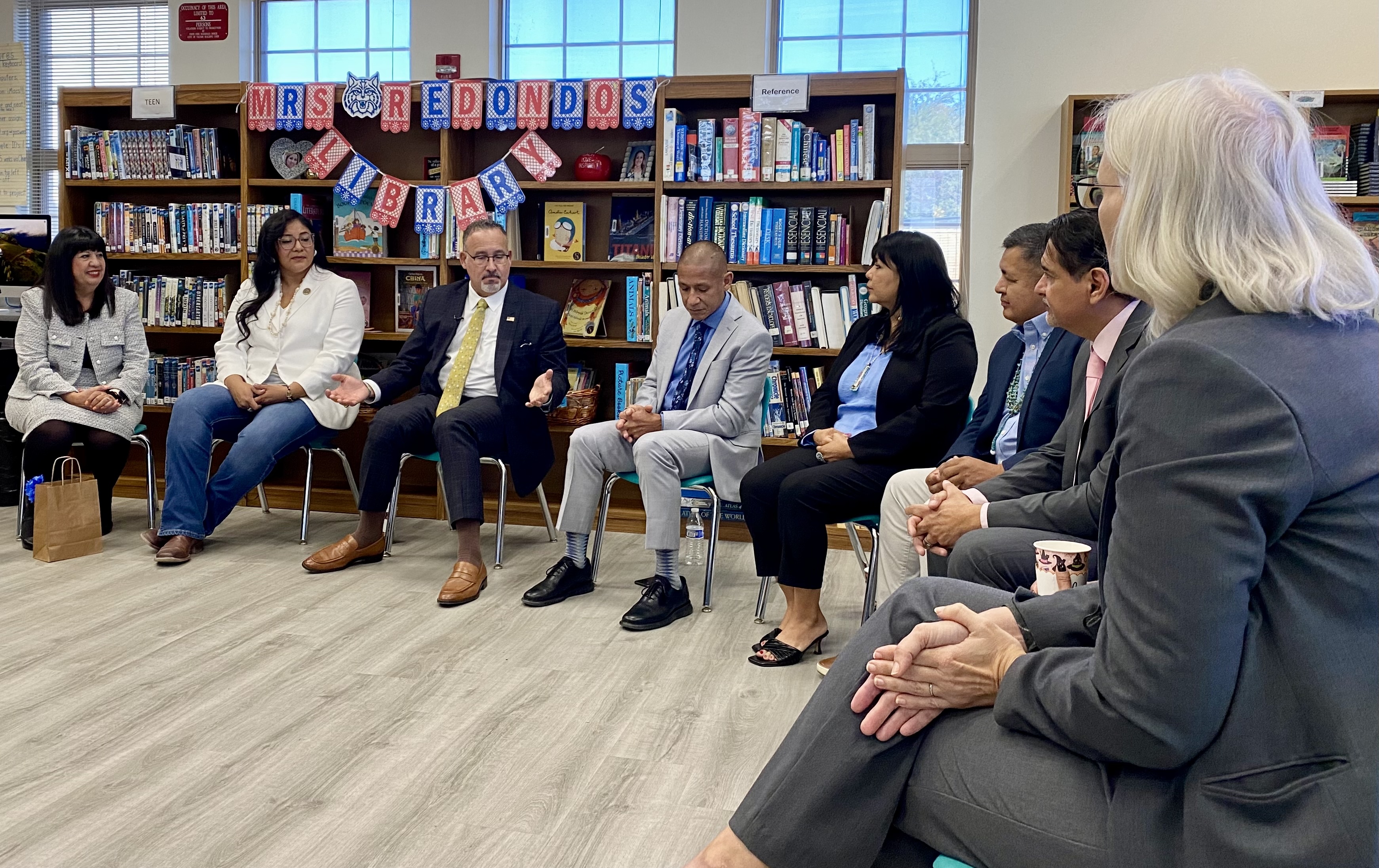 U.S. Secretary of Education Miguel Cardona speaks with administrators and educators at Tucson Unified's TUSD’s Roskruge Bilingual K-8 Magnet school on Oct. 31, 2024.