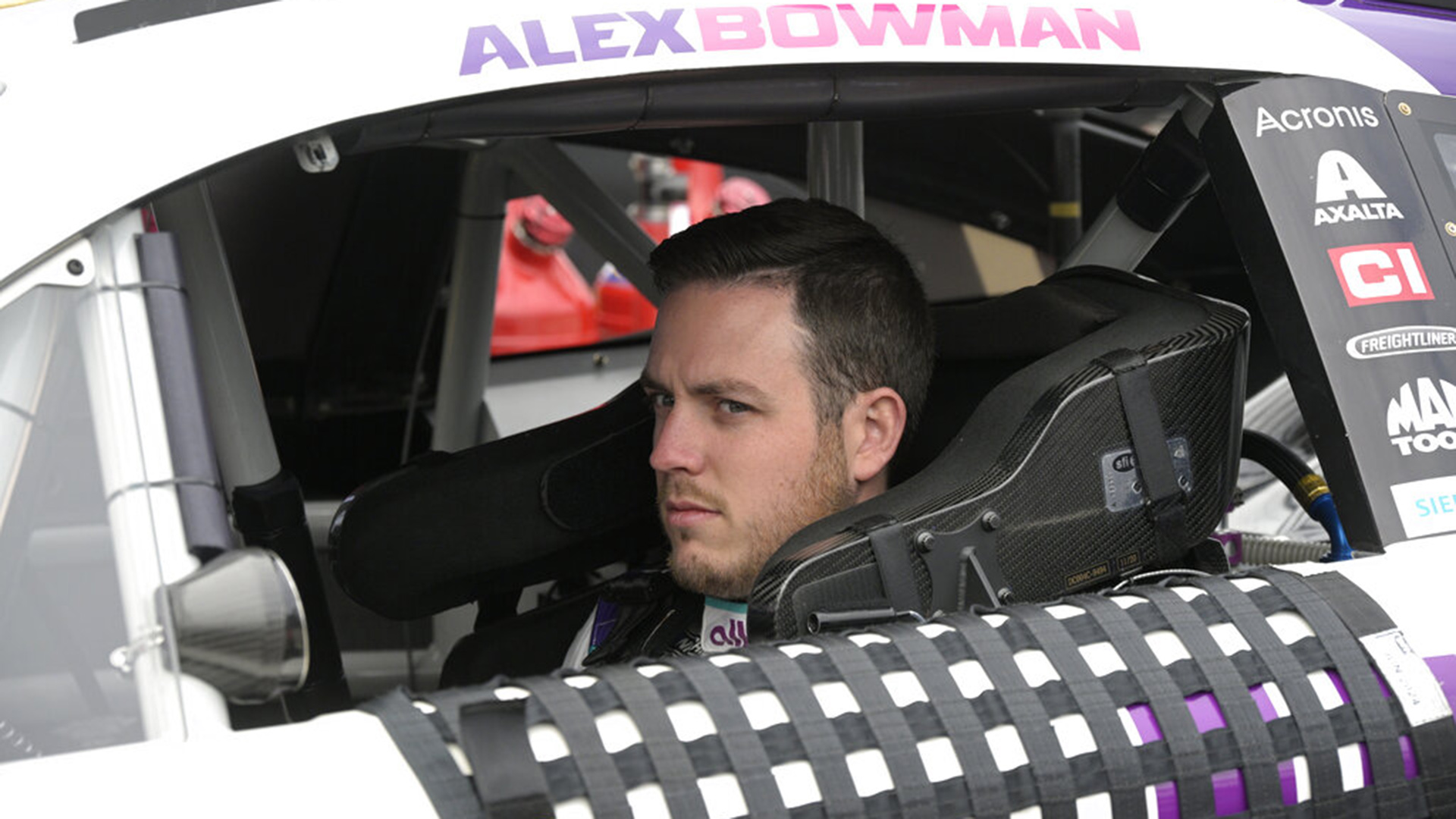 Alex Bowman sits in his car during a practice session for the Daytona 500 auto race at Daytona International Speedway, Saturday, Feb. 19, 2022.