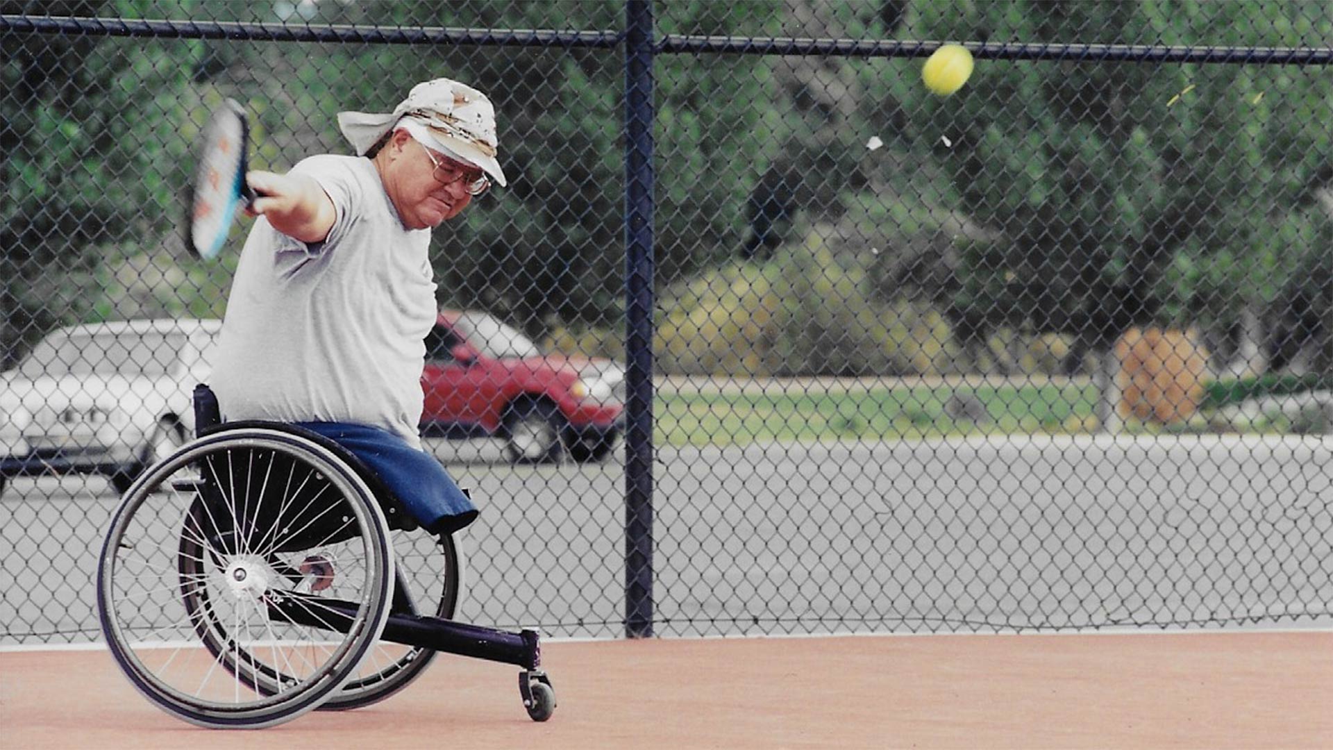 Former University of Arizona wheelchair basketball player and founder Rudy Gallego plays tennis.