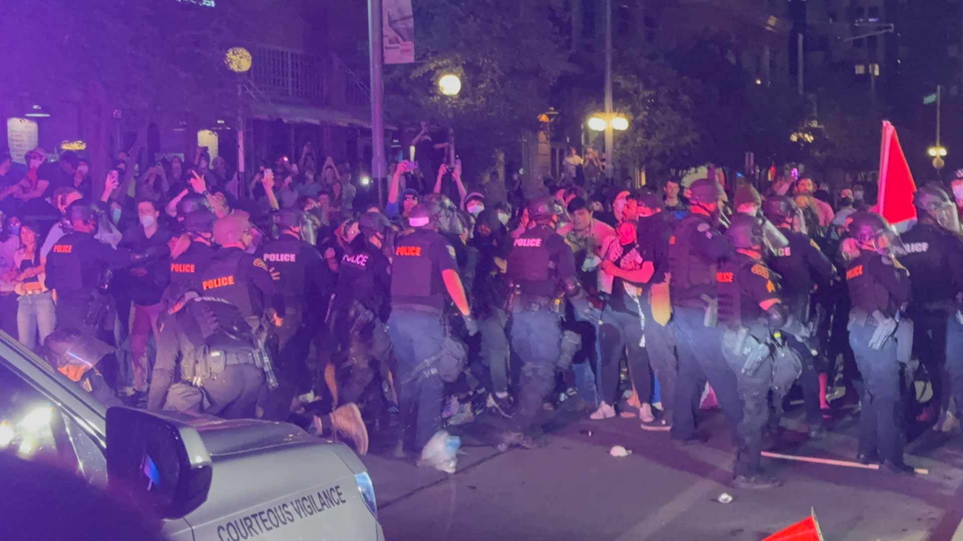 Police and protestors clash at 2:00 a.m. on Park Avenue on the edge of the University of Arizona campus as officers worked to break up a pro-Palestine encampment on campus. May 1, 2024