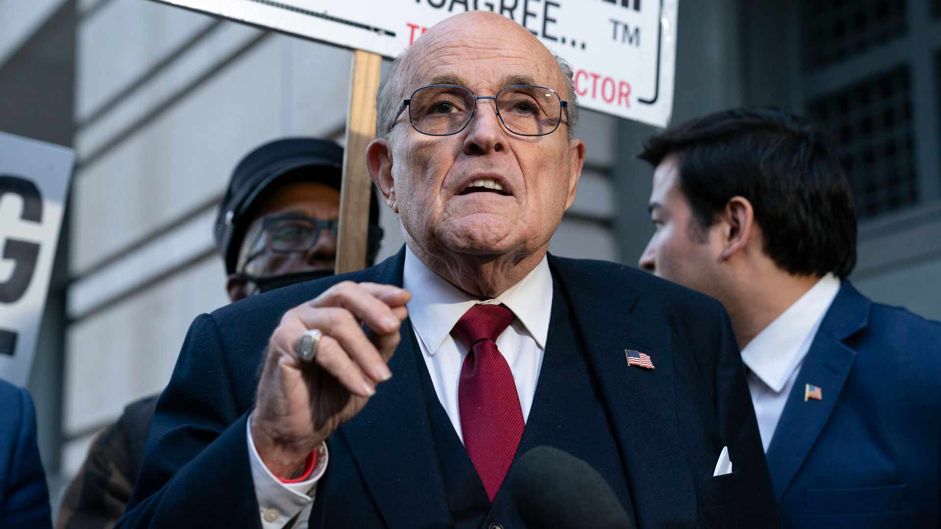 Former Mayor of New York Rudy Giuliani speaks during a news conference outside the federal courthouse in Washington, Dec. 15, 2023. 
