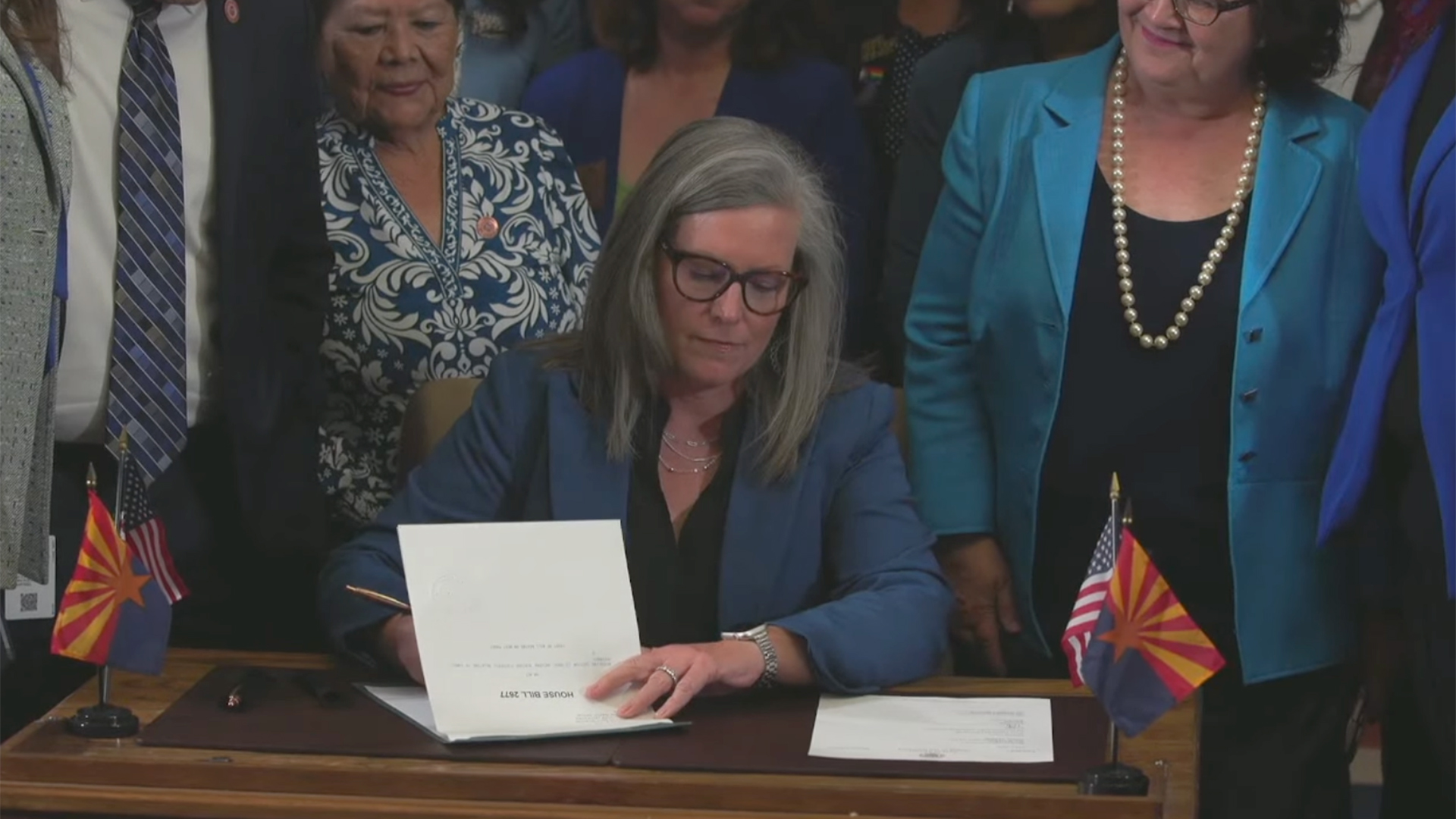 Governor Katie Hobbs signs the repeal of Arizona's near-total abortion ban from 1864 during a signing ceremony in Phoenix, AZ on May 2, 2024/