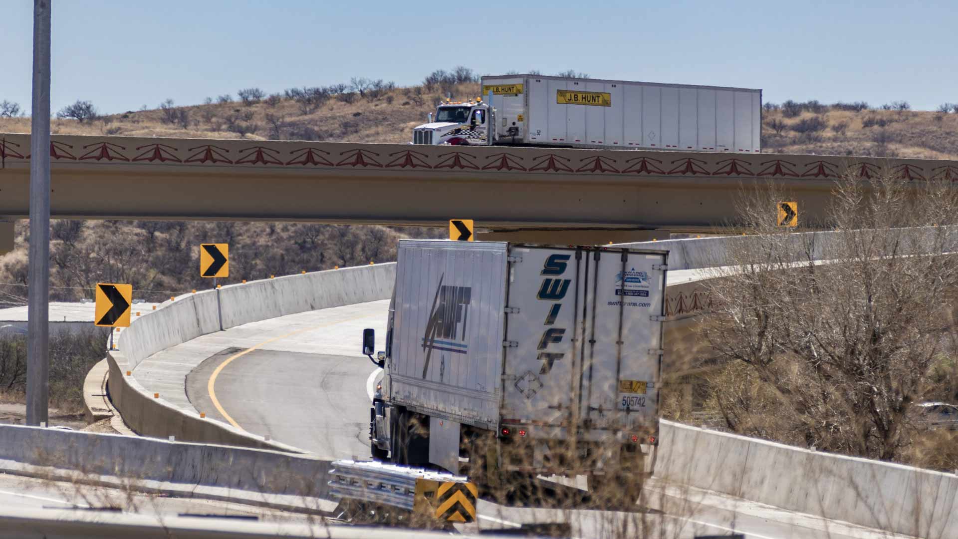 Trucks drive on SR-189, near Nogales, on March 10, 2022. 
