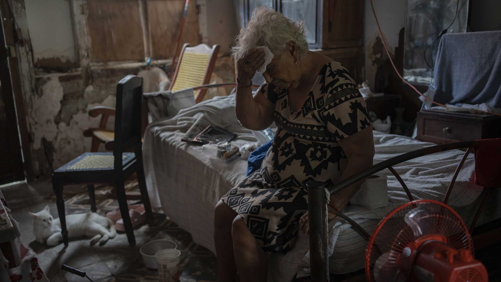 Margarita Salazar, 82, wipes the sweat off with a tissue inside her home amid high heat in Veracruz, Mexico, on June 16, 2024. Human-caused climate change intensified and made far more likely this month's killer heat with triple digit temperatures, a new flash study found Thursday, June 20.