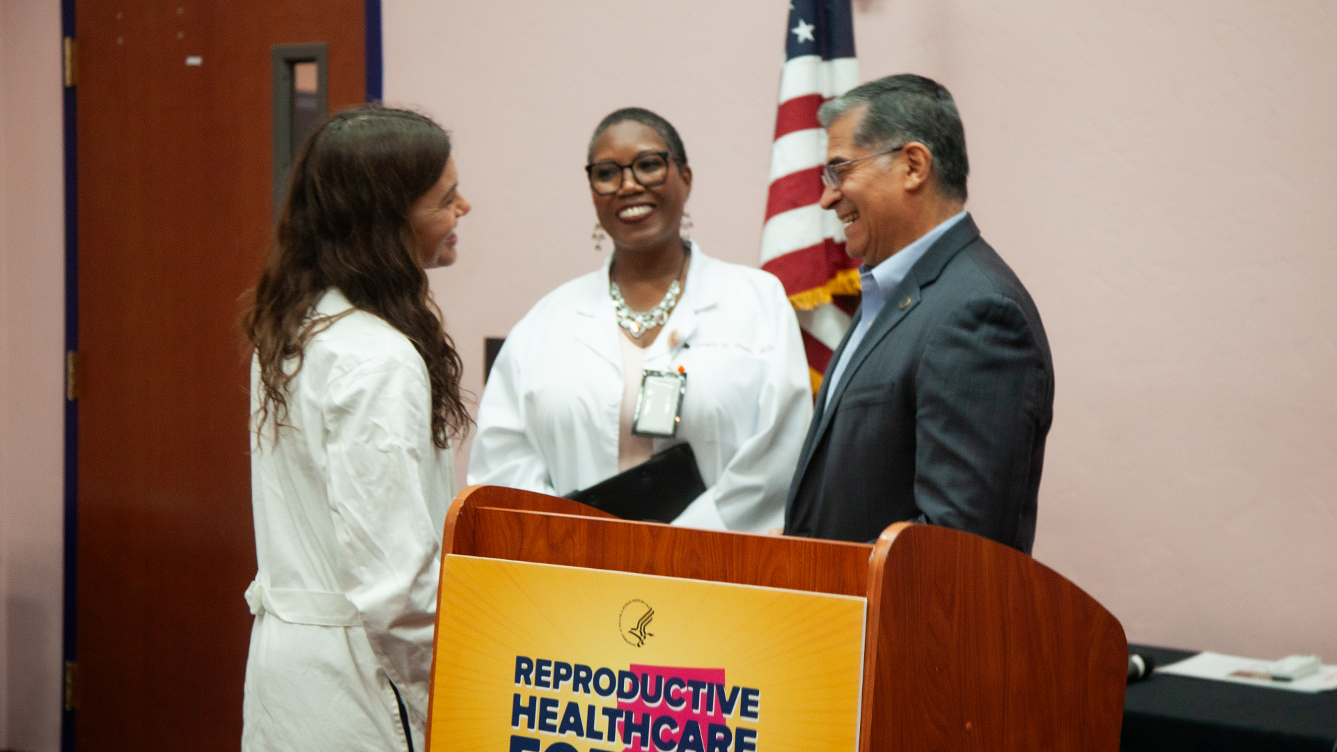 United States Secretary of Health and Human Services Xavier Becerra (right) speaks to Dr. Sigrid Williams (left) and Dr. Gayle Dean (middle) about reproductive healthcare access in Arizona during his Reproductive Healthcare for All Tour at the YWCA of Southern Arizona in Tucson on Thursday, June 20, 2024. Arizona is one of six states he will be visiting.