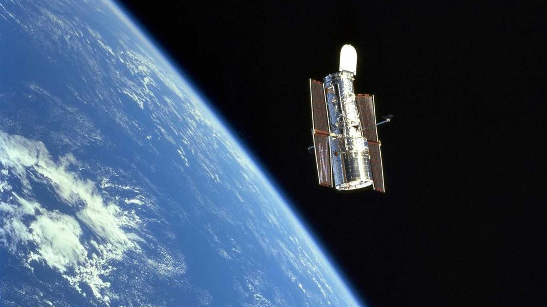The Hubble Space Telescope in orbit in 1999, just after a servicing mission by astronauts.